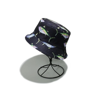 Detail of black bucket hat with colorful tuna fish prints on high-quality cotton fabric