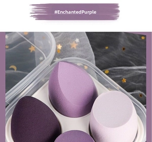 Detail of purple makeup sponge set in drop and slant shapes with storage box