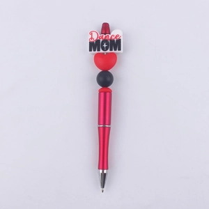 Detail of red beaded pen featuring Dance MOM silicone focal bead and heart accents