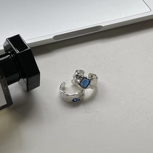 Irregular textured S925 silver open rings featuring rectangle and round blue gemstones