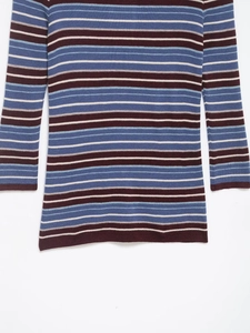 Detailed close-up of the ribbed knit texture and multicolored horizontal stripes pattern