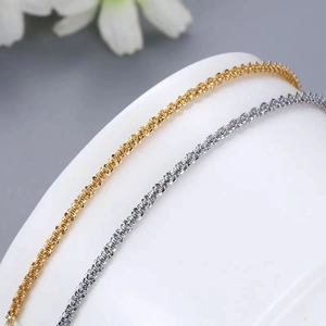 Golden and silver stainless steel woven chain bracelets in minimalist design