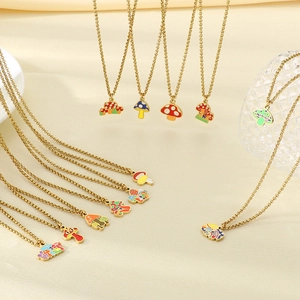Colorful enamel mushroom necklaces with gold-tone chains in various vibrant designs