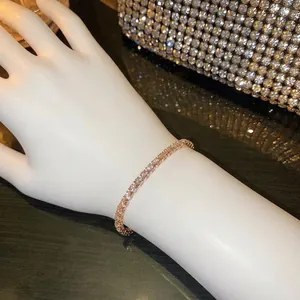 Elegant gold tennis bracelet with shimmering cubic zirconia crystals for women worn on wrist