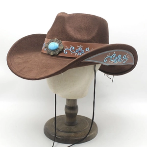 Brown western cowboy hat with floral embroidery and turquoise buckle on white mannequin
