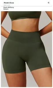 Close-up of deep army green seamless high waist yoga shorts with ribbed compression band