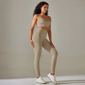 Detailed texture of seamless ribbed knit fabric on high waist yoga leggings and bra set