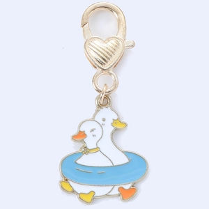 Cute cartoon duck couple keychain with blue swimming ring and gold heart clasp