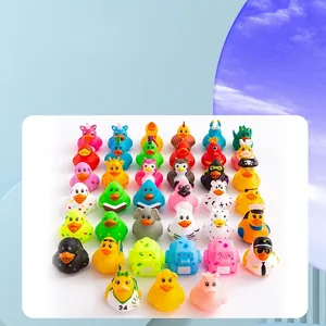 Variety set of 24 colorful rubber ducks in diverse animal and career outfits for bath time