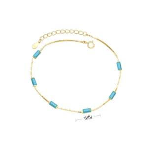 Detail of a 925 silver gold bracelet featuring six 6mm rectangular turquoise stones