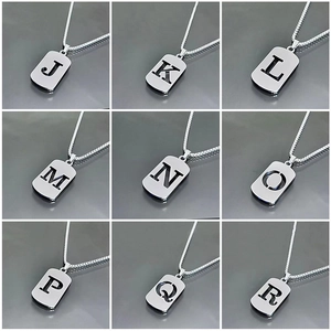 Silver stainless steel alphabet pendant necklaces with hollow letter cutouts in a grid