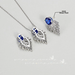 Detailed view of S925 silver jewelry set with blue gemstone and marquise zirconia accents