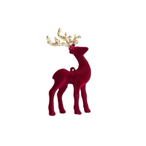 Red velvet Christmas reindeer ornament with gold glitter antlers on white background