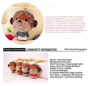 Close-up of rhinestone monkey keychain showing dimensions of 5.9x4.5cm and zinc alloy material