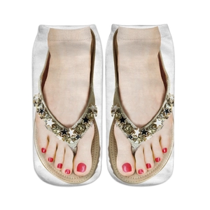 Detail of 3D flip-flop print socks with golden star flip-flops and red nails