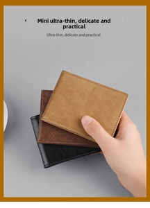 Three stacked ultra-thin matte wallets in black, dark brown and light camel leather