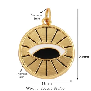 Macro detail of 17x23mm gold-plated evil eye charm with dimensions and zircon inlay