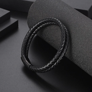 Men's double-layered black braided leather bracelet with a secure magnetic clasp