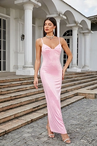 Close-up of pink sequin dress fabric texture with elegant side slit detail