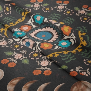 Detail showing high-quality bohemian floral print fabric with lunar phases and grey texture