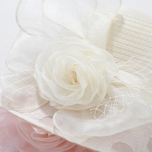 Elegant organza bridal sun hat with handmade rose and pearls in cream and pink