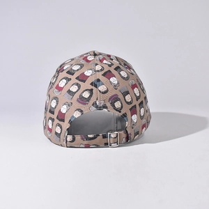 Detail view of cartoon pattern baseball cap with adjustable silver metal buckle at the back