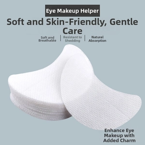 Macro detail of breathable non-woven white crescent eye pads for makeup isolation
