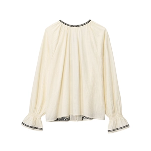 Chemisier beige ample en coton avec broderie noire sur l'encolure et les manches cloche