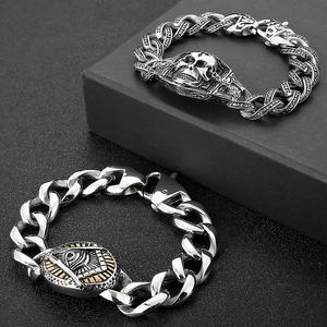 Detail of gothic skull and eye of providence stainless steel mens bracelets