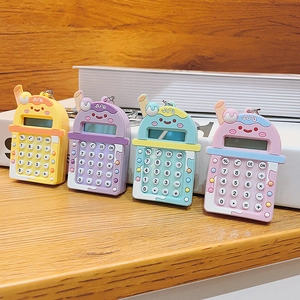 Creative milk tea cup mini calculators on a wooden desk in four pastel macaron colors