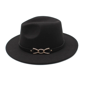 Close-up of black wool fedora featuring a slim leather band and golden chain buckle