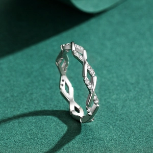Elegant s925 silver ring featuring a twisted woven design with shimmering micro-set zircons