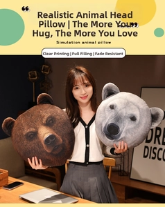 Detail showing plush animal head cushions with realistic bear print in home setting