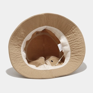 Beige cotton bucket hat with S embroidery, 100% cotton material and inner sweatband