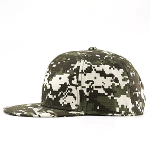 Close-up of pixelated digital camouflage pattern and ripstop fabric on snapback hat