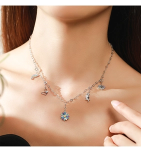 Detailed view of S925 silver necklace with rainbow butterfly sunflower and heart charms