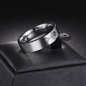 Minimalist silver titanium steel ring featuring a colorful etched stickman figure