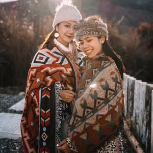 Bohemian style camping blanket with geometric patterns and tassels for outdoor picnic