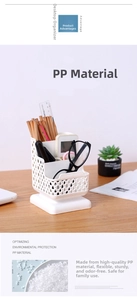 Detail of white rotating desk organizer with hollow woven texture and multiple compartments