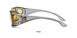 Detailed side view of yellow night vision lenses and translucent grey frame