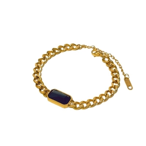 Chic gold Cuban link chain necklace with a rectangular deep blue sapphire gemstone