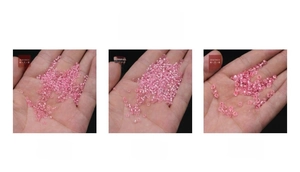 Macro detail of light pink silver-lined glass seed beads in 2mm 3mm and 4mm sizes