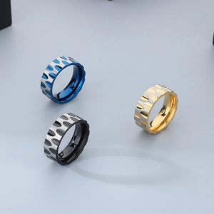 Minimalist wave texture stainless steel rings in blue, black, and gold colors