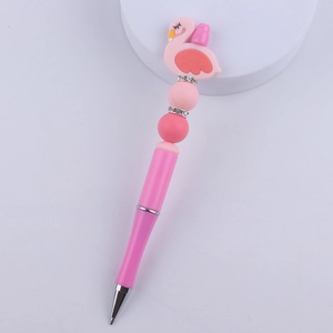Detail view of a pink flamingo bead pen with sparkling rhinestone accents and silver rings