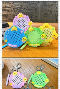 Close-up of Lucky Duck magnetic drawing board keychain with stylus for stress relief