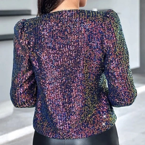 Rear view detail of sequin blazer featuring gradient leopard print and bubble sleeves