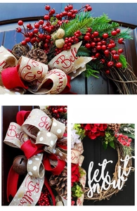 Close-up of Christmas wreath with red berries, pine cones, and a Jingle Bells ribbon