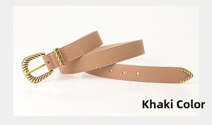 Detail of khaki leather belt with vintage bronze twisted buckle and ornate metal tip