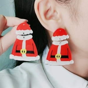 Asymmetric Christmas earrings featuring red Santa Claus suit charms in acrylic material