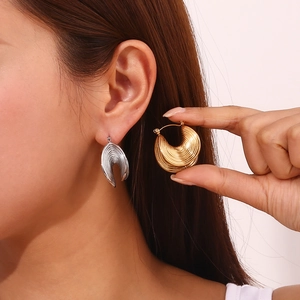 Textured U-shaped layered hoop earrings in gold and silver finish for women